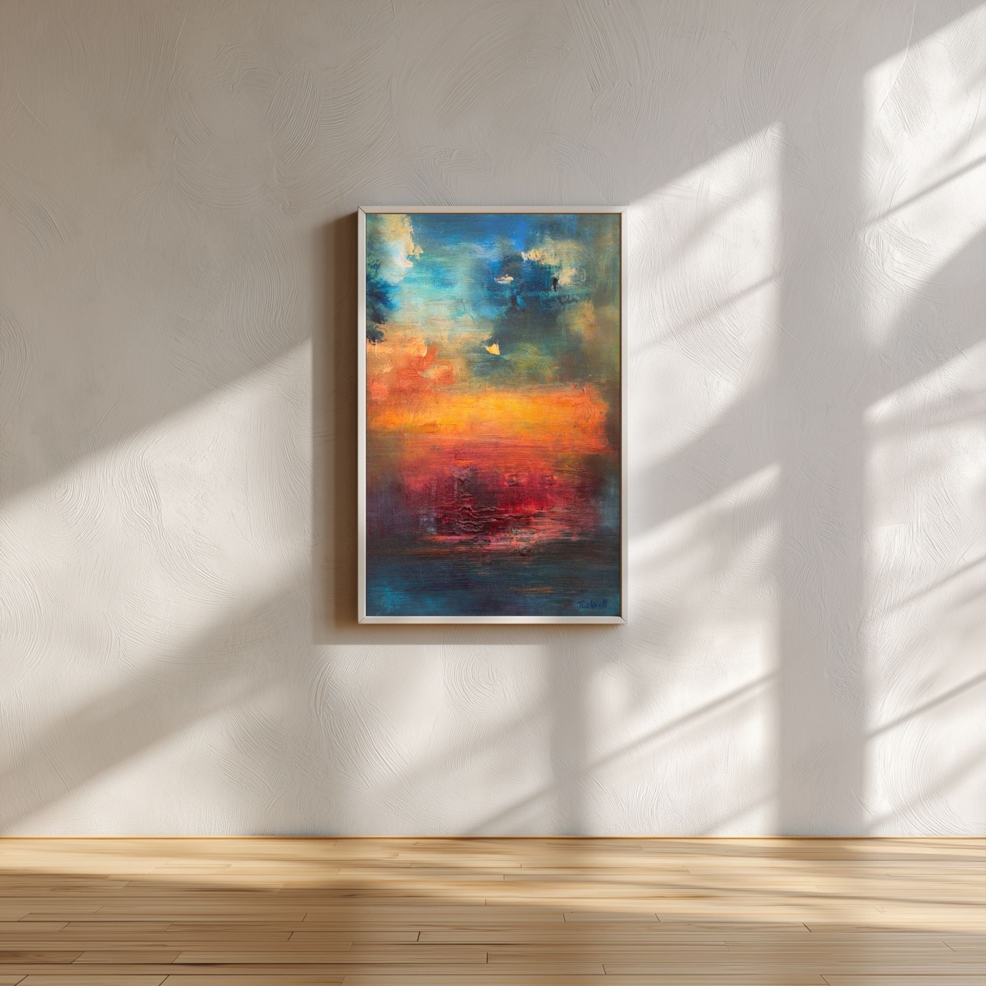 Rainbow Landscape original abstract painting on wood panel, featuring vivid blue, orange, and red cloud-like textures and expressive brushwork on a wall with sunlight casting shadows.